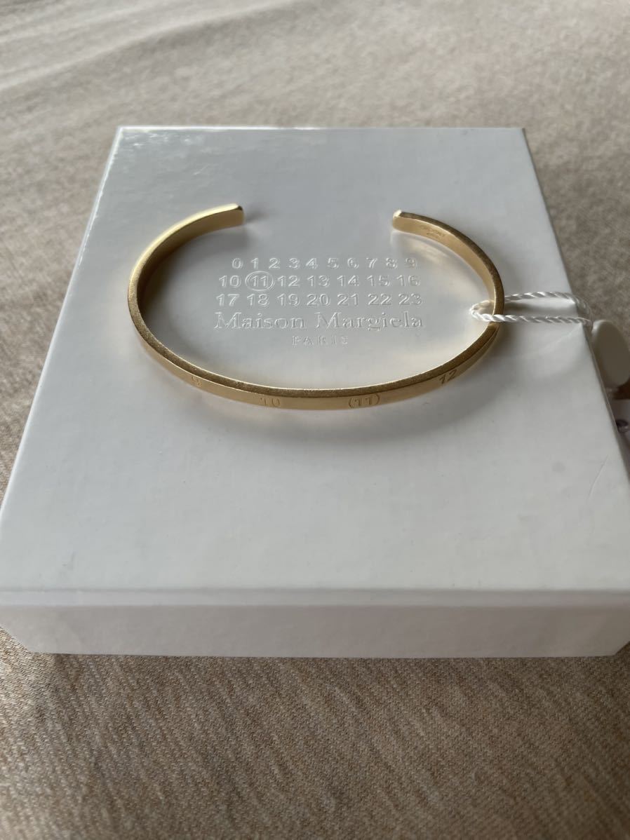 お洒落無限大。 ゴールド メゾンマルジェラ M新品 MAIZON MARGIELA
