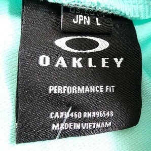 OAKLEY オークリー スカル 新品 定1.3万 吸汗速乾 4WAYストレッチ プルオーバーシャツ ゴルフウエア FOA402505 78K XL ▲036▼kkf1731aの画像5