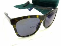 ■新品■未使用■ GUCCI グッチ GG0057SK 004 サングラス メガネ 眼鏡 メンズ レディース ブラウン系×ネイビー系 AG4059アZ_画像1