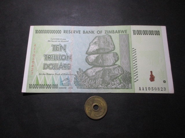 ソフトパープル ジンバブエドル旧紙幣 100兆ドル 新品未使用認定済 68