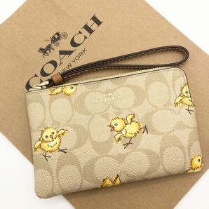 【COACH☆新品】☆リストレットポーチ☆シグネチャー キャンバス☆トス チック☆