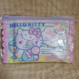 ☆ハローキティ　ビニールポーチ入りプチタオル　キャンディ　新品未開封　SANRIO　HELLOKITTY　サンリオ正規品　ファスナー付きポーチ