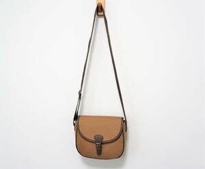 22 year Samansa Mos2 cologne . pretty canvas belt shoulder bag 