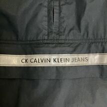 カルバンクライン ジーンズ Calvin Klein Jeans アノラックジャケット ウィンドブレーカー ナイロン フード収納 黒 L 古着 ユーズド_画像3