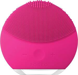  electric . face cleansing brush 