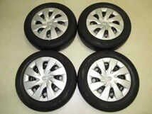 トヨタNCP141スペイド純正スチール 5J-15 off+40 pcd100/4H ハブ径54ミリ ダンロップ 175/65R15 ラジアルタイヤ付き4本セット_画像1