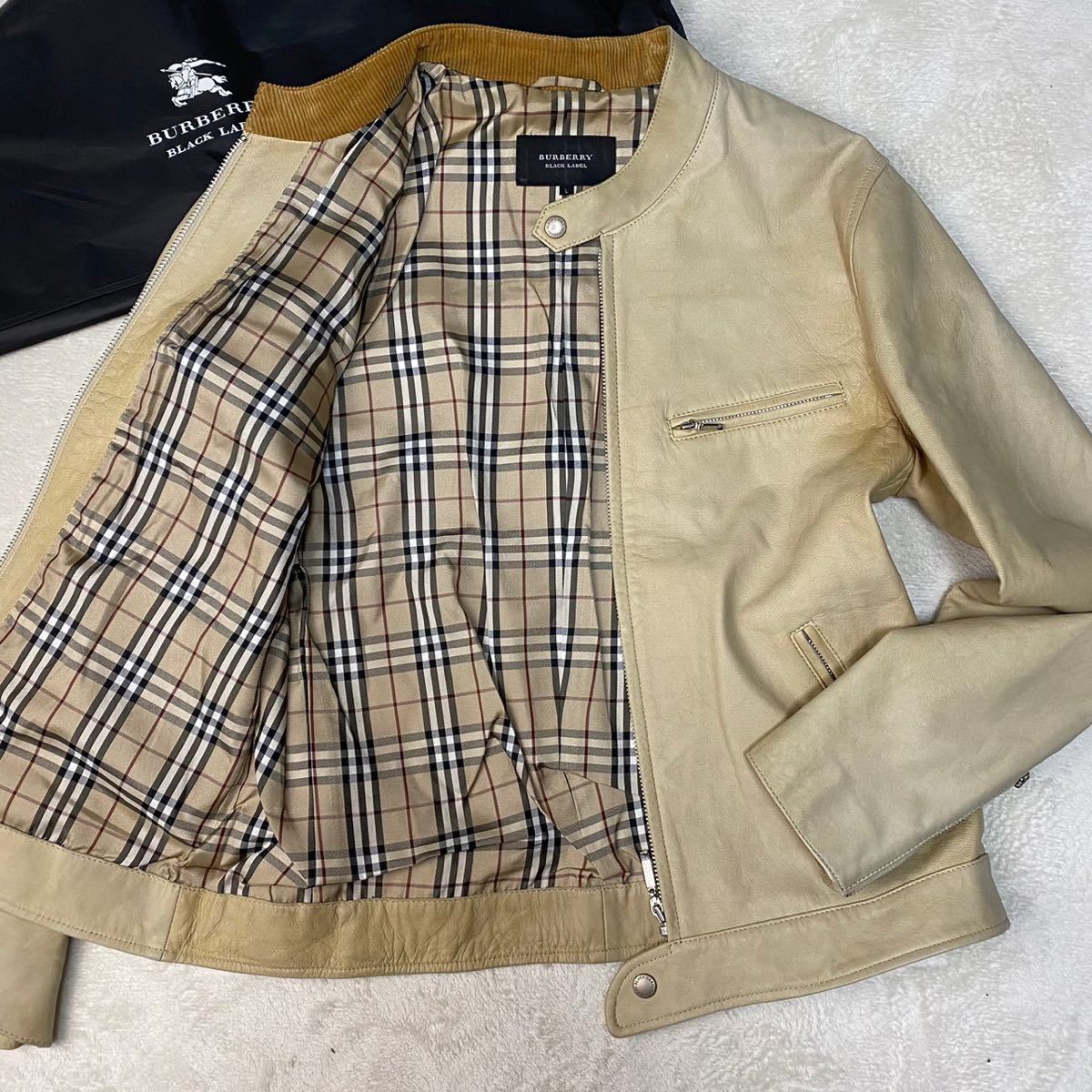 ヤフオク! -「burberry black label レザーライダース」の落札相場