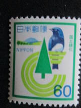 記念切手　未使用　　’82　国土緑化　 60円：植樹祭のマークとオオルリ鳥　　　1枚_画像1