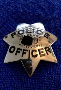  Ricci Monde city . main . the truth thing Police badge sterling silver made Ed Jones California 