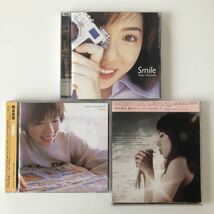 B15063　中古CD　Smile+Hello+魔法のリングにKiSSをして　岡本真夜　3枚セット_画像1