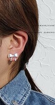 ★ 両耳用 オシャレ リボン ピアス ★ モチーフピアス スタッド 耳飾り ジュエリー イヤリング アクセサリー 銀_画像6