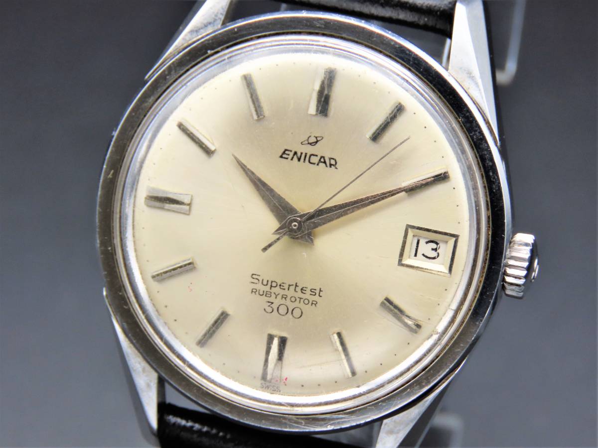土星のマークの、エニカ・スイス製 紳士手巻き - 時計