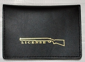 No.15 black cow leather made gun guarantee . licence inserting * gun .LICENSE gold . pushed .* Made in USA