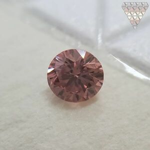 0.09 ct FANCY INTENSE ORANGY PINK ROUND 