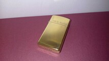 ZIPPO ジッポー 1991年 ソリッドブラス SOLID BRASS 無地 スリム ダブルイヤー 1932-1991 中古 オイルライター プレーン 　真鍮_画像1