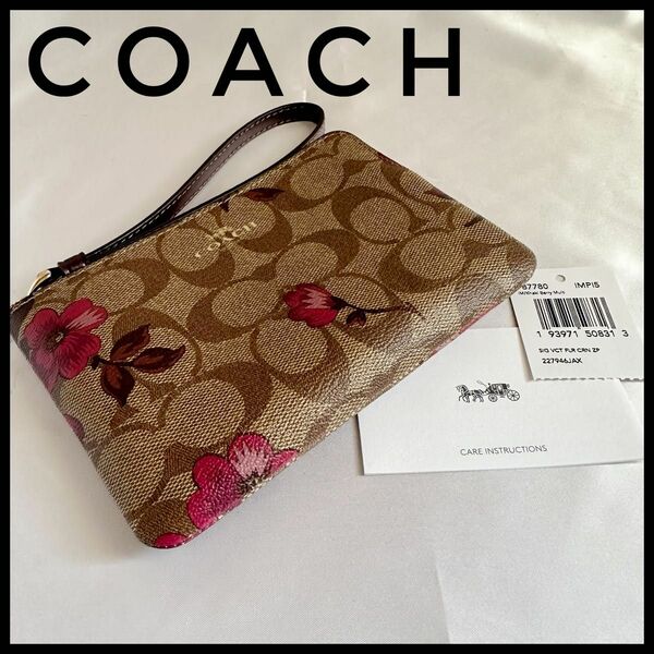 【未使用】COACH コーチ　フラワーミニポーチ　シグネチャー　花柄　PVC ストラップ