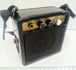  electric guitar amplifier speaker volume tone overdrive correspondence 9V battery & adapter shoulder strap . belt hook attaching *.8