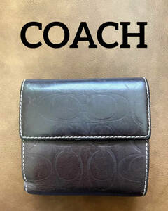 コーチ/COACH/本革2つ折り財布/コンパクト/ブラウン/シグネチャー/レザー/茶色系/ロゴ柄/高級/存在感/上品/上質/スタイリッシュ/人気モデル