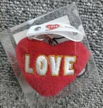 【新品・未使用・非売品】LOVE in Action 非売品クッションストラップ_画像1