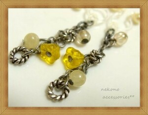 * unused * clear yellow . flower beads * mat silver color. long chain earrings *97