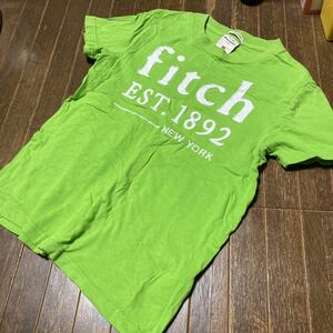 正規本物アバクロキッズMサイズ半袖コットンTシャツグリーン黄緑140-150フィッチアップリケ丸首レディースならXSくらい