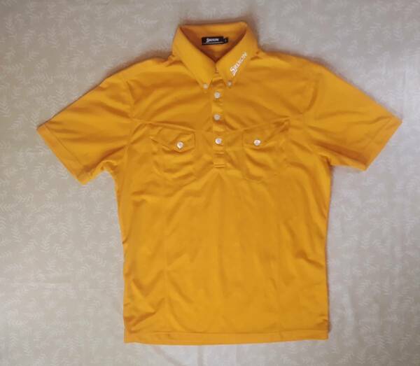 美品！　スリクソン SRIXON　半袖シャツ　サイズＭ（やや大きめ）柔らかい　やや光沢オレンジ色　細かいメッシュ風 ドライ速乾薄手生地　