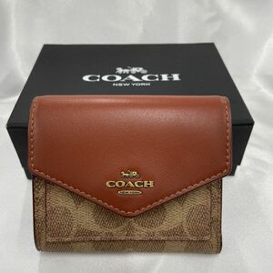 COACH コーチ　三つ折り財布 31548 シグネチャー　ブラウン　ボルドー