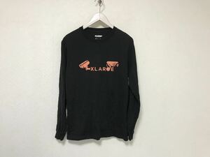 本物エクストララージXLARGEコットンロゴ文字長袖ロンTシャツメンズサーフアメカジビジネスミリタリー黒ブラックSストリートスケーター