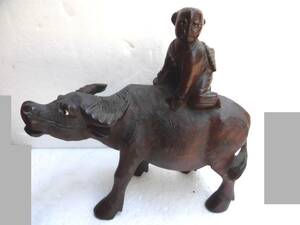  wooden tree carving cow . ride man dragon eyes tree . chinese quince I think 