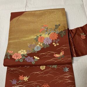 九寸名古屋帯(正絹)唐織 花舞蝶文 金糸 O-241