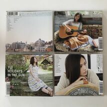 B16696　中古CD　CAN'T BUY MY LOVE (初回限定盤)(DVD付)+MY SHORT STORIES+HOLIDAYS IN THE SUN+HOW CRAZY YOUR LOVE　YUI　4点セット_画像2