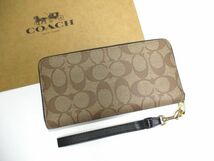 COACH 長財布 新品 同様 未使用 正規品 [228] ジッピーウォレット メンズ レディース C5615 リストストラップ バスキア 恐竜 クラウン_画像2