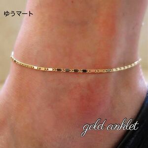  gold chain anklet lady's summer accessory small eyes small is seen join ... black . white .GOLD gold