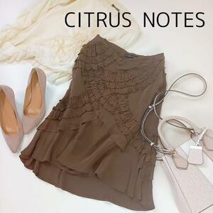  Citrus Notes Brown midi height skirt silk made size 38 knee height 