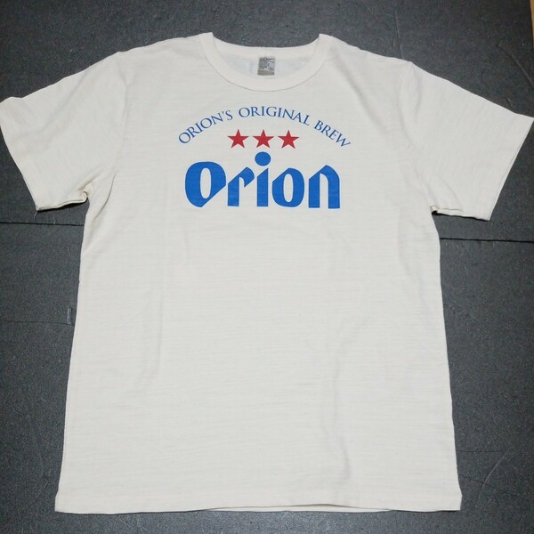 ● オリオンビール「Orion Tシャツ 1枚」着丈：約64cm／身幅：約49cm　半袖 表記サイズM　シャツ　アイボリー系　缶ビール柄