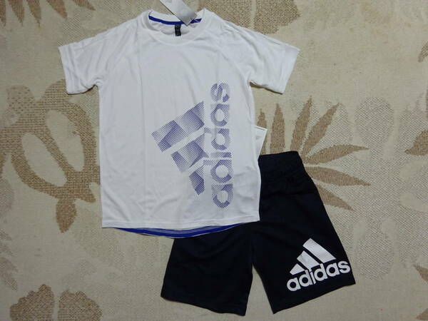 送料込み!!★新品★adidasアディダス★140★快適!!★人気のグラフィック!!半袖Ｔシャツ(白)・ビッグロゴハーフパンツ(紺)★上下★即決