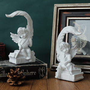 北欧デザインのシンプルな天使の置物 左右でデザインが違う 白 ホワイト 男の子 羽 オブジェ インテリア エンジェル リビング 玄関