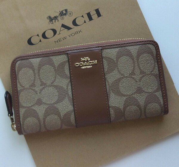 【新品】COACH コーチ 長財布 シグネチャー 　カーキ　サドル