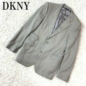 DKNYディーケーエヌワイストライプテーラードジャケット グレーカジュアル バックスリット入り ポケット有 ビジネス フォーマル 38 B2529