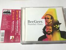 リマスター国内盤帯付CDベスト20曲/BEE GEES/ビー・ジーズ/愛はきらめきの中に〜ナンバー・ワン・ヒット・ソングス 送料¥180_画像1