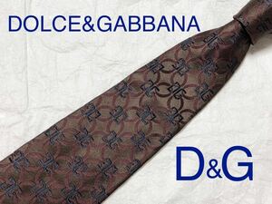 DOLCE & GABBANA ドルチェ&ガッバーナ　ネクタイ　　DG総柄+花柄　シルク100% イタリア製　ブラウン系