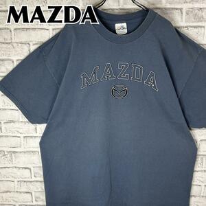 MAZDA マツダ センターロゴ 肉厚ロゴ エンブレム Tシャツ 半袖 輸入品 春服 夏服 海外古着 会社 企業 車 カー 自動車 アーチロゴ ゆったり