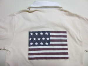 美品 Ralph Lauren ラルフローレン 長袖ラグビーシャツ サイズM ベージュ色単色に襟は白色 背中全面に星条旗のワッペン縫付け