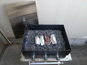 ya... burning. grill gas boiler set Event festival stone roasting .. corm .... shop . fire BBQ roasting corm equipment sweet potato . charcoal fire brazier . roasting 