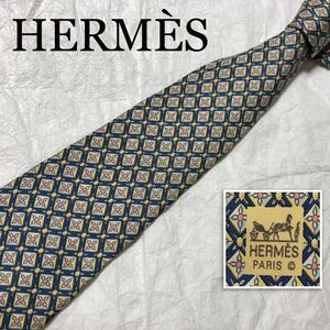 ■美品■HERMES エルメス　ネクタイ　宝石　ジュエリー　スクエア総柄　シルク100% フランス製　ブルー×イエロー×オレンジ