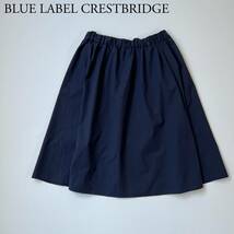 BLUE LABEL CRESTBRIDGE ブルーレーベルクレストブリッジ フレアスカート ウエストゴム　膝丈スカート ネイビー　シンプル レディース_画像1