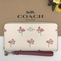 COACH 長財布 ★大人気★ ロングジップ アラウンドウォレット フラミンゴ プリント CJ569 SVTLM 新品_画像1