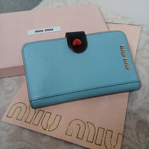 極美品 定価59,800円 ミュウミュウmiu miuマドラスMADRASハート5ZH106手帳型スマホケースiPhoneX XS対応ブルー×黒ブラック×赤レッドPRADA