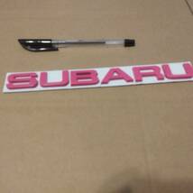【送料無料】SUBARU エンブレム ピンク 横21.5cm×縦3cm×厚さ5mm ②　スバル SUBARU 金属製_画像1