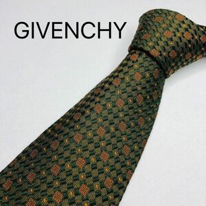 GIVENCHYジバンシー　ネクタイ ハイブランド　オレンジロゴ柄ブラウン　高級シルク100%